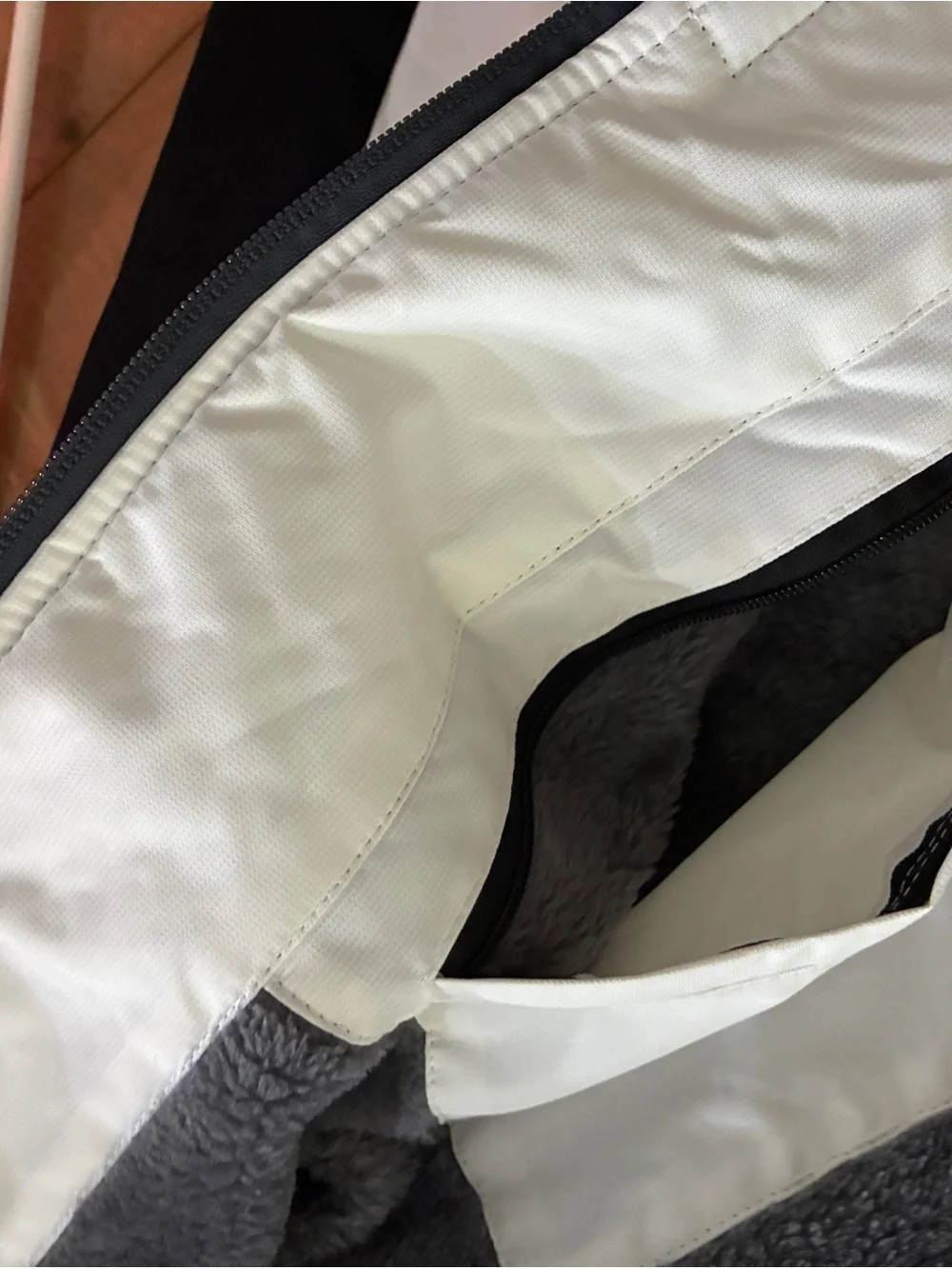 Two-Tone White and Black Winter Jacket with Faux Fur Hood
